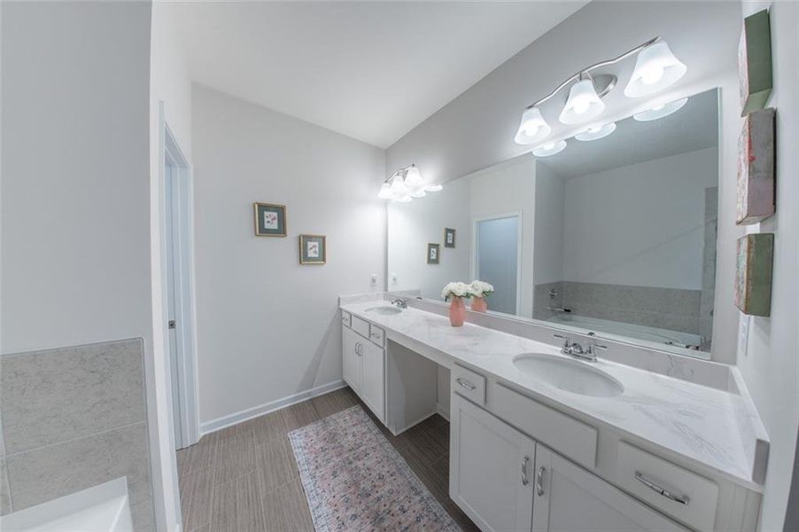Furnished interior view inside a new home in Ellison Square, Sugar Hill (Image 27). Furnished interior view inside a new home in Ellison Square, Sugar Hill (Image 27).