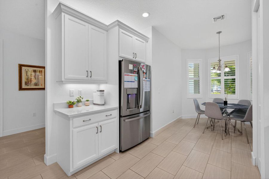 Furnished interior view inside a new home in , Port St. Lucie (Image 35).