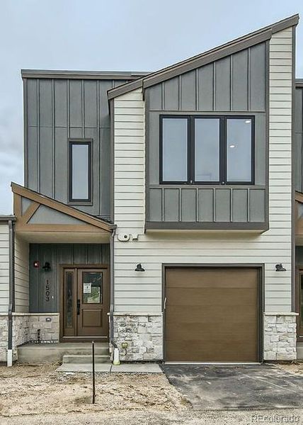 Front exterior of a new home in , Tabernash, CO, highlighting curb appeal (Image 2).