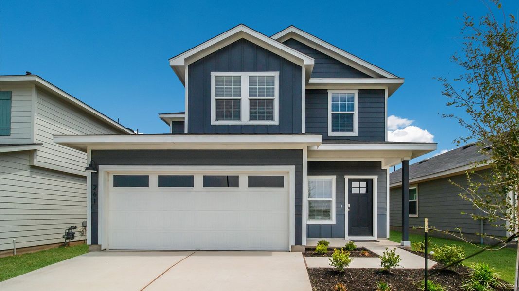 Representative exterior photo of a completed home built from the The Hanna by D.R. Horton in Watermill, Uhland, TX (Image 1).