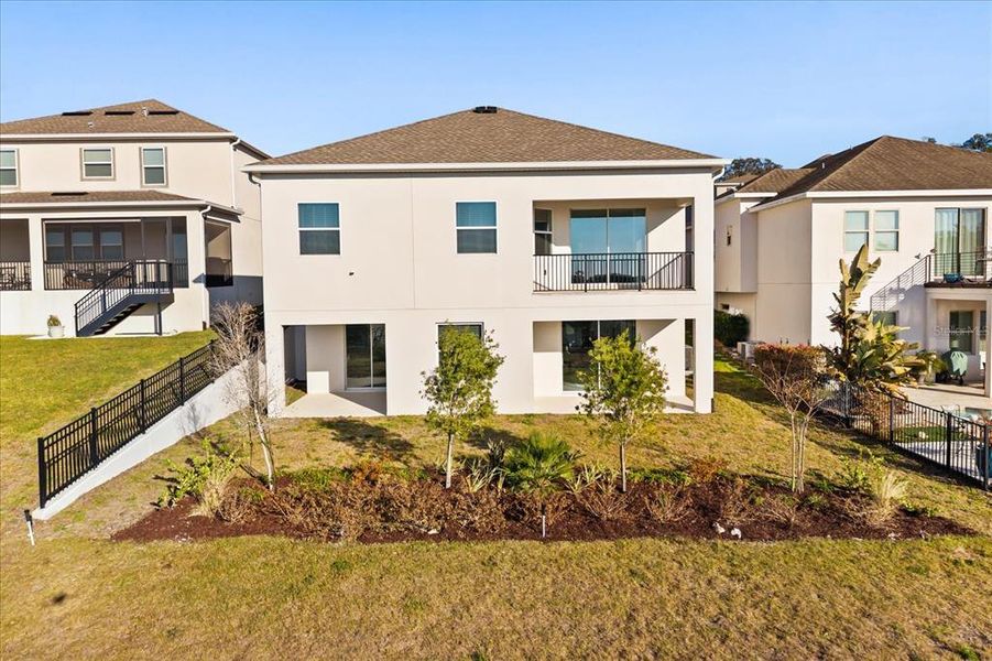 Front exterior of a new home in Dora Parc, Mount Dora, FL, highlighting curb appeal (Image 29).