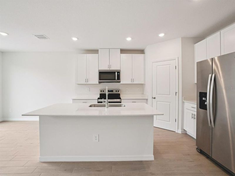 Furnished interior view inside a new home in Salt Meadows - Classic Series, Parrish (Image 4).