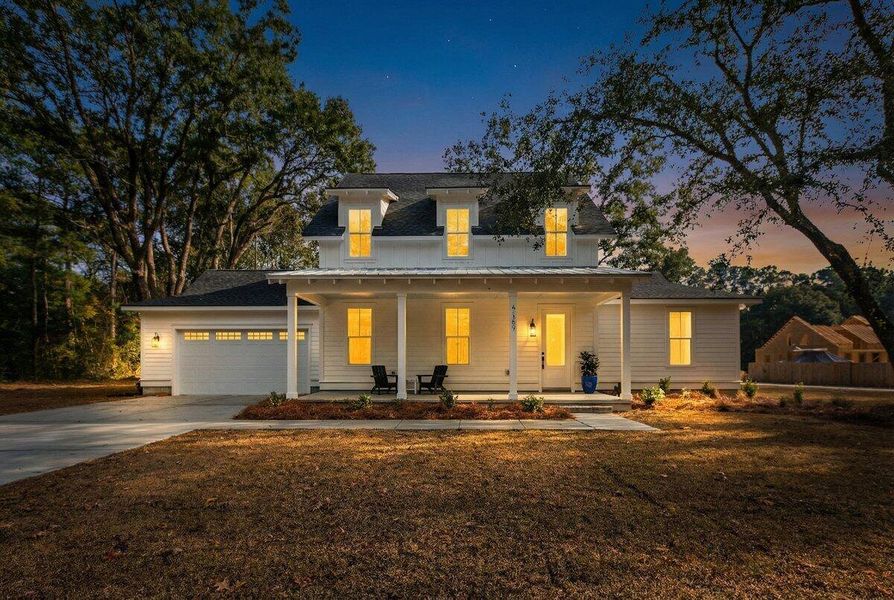 Front exterior of a new home in , Awendaw, SC, highlighting curb appeal (Image 24).