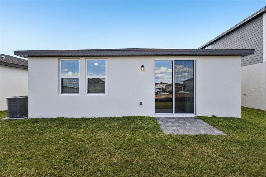 Exterior details and patio area of a home in Crosswinds - Classic Series, Haines City (Image 20).