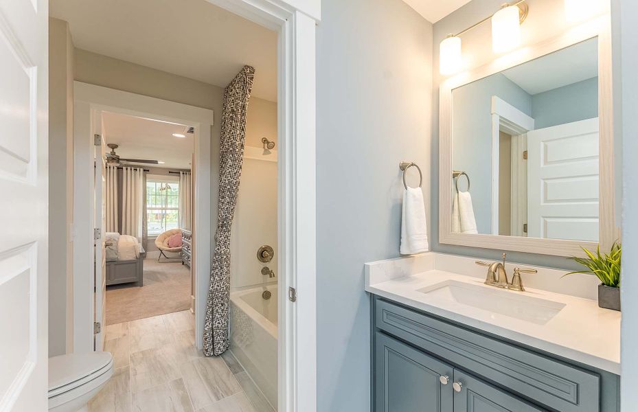 Jack and Jill bath connecting the secondary bedrooms