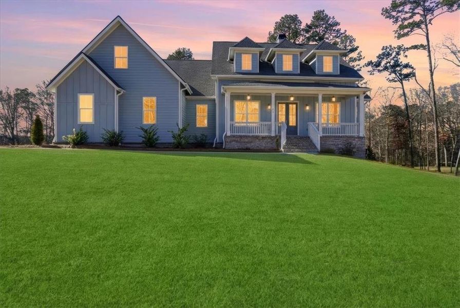 Front exterior of a new home in Old Town Estates, Dacula, GA, highlighting curb appeal (Image 30).