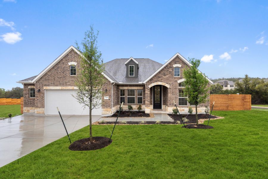 Representative exterior photo of a completed home built from the Palmer by Ashton Woods in The Estates at La Cima, San Marcos, TX (Image 1).
