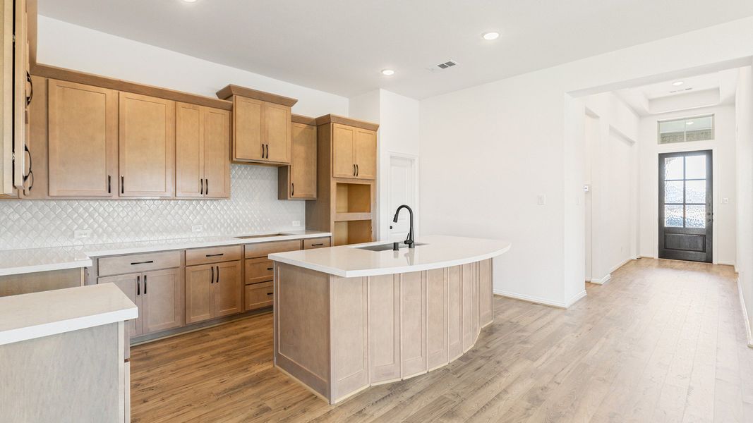 Furnished interior view inside a new home in Sunterra, Katy (Image 19).