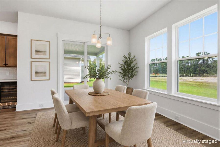 Furnished interior view inside a new home in Summerwind Crossing at Lakes of Cane Bay, Summerville (Image 3).