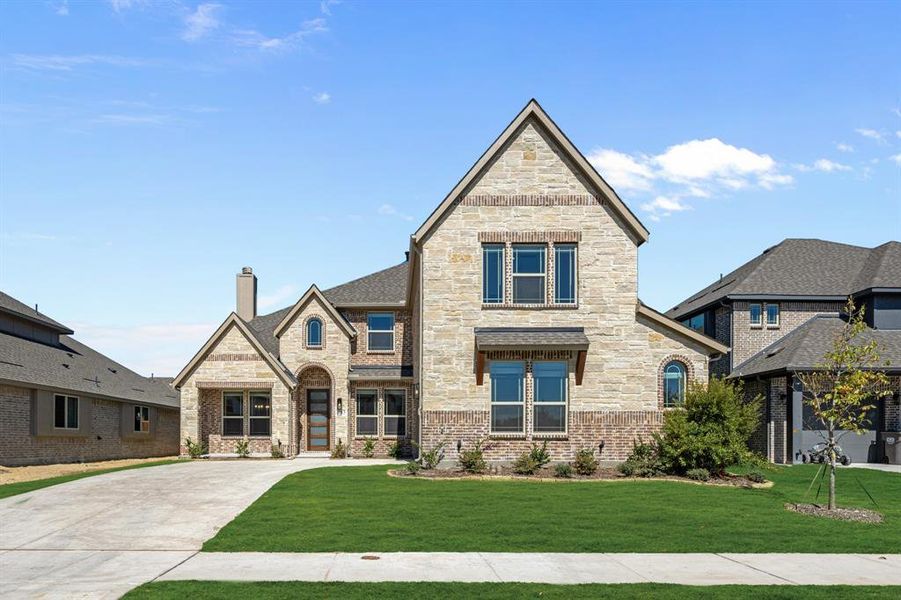 Front exterior of a new home in Liberty, Melissa, TX, highlighting curb appeal (Image 16). Front exterior of a new home in Liberty, Melissa, TX, highlighting curb appeal (Image 16).
