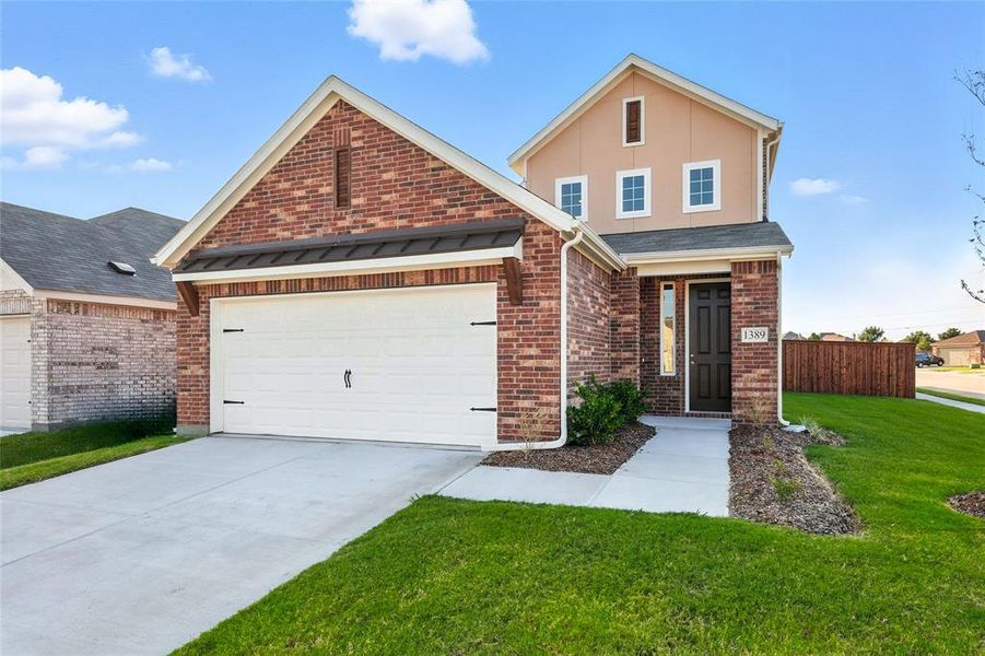 View of front of house with brick siding, driveway, and a garage View of front of house with brick siding, driveway, and a garage