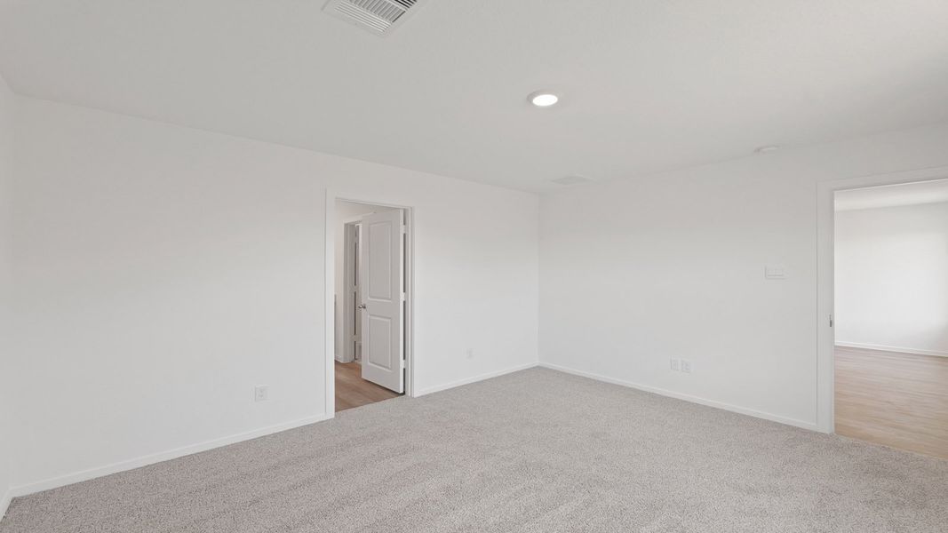 Representative unfurnished interior of a home built from the Estero by D.R. Horton in Lake Conroe Cove, Willis (Image 28). Representative unfurnished interior of a home built from the Estero by D.R. Horton in Lake Conroe Cove, Willis (Image 28).
