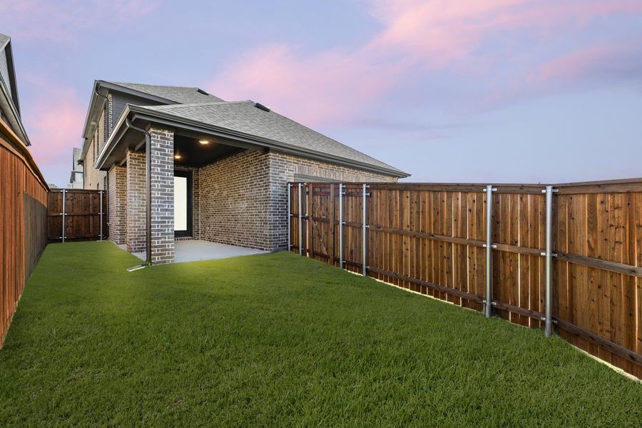 Exterior details and patio area of a home in Hillside Village 40s, Celina (Image 19).