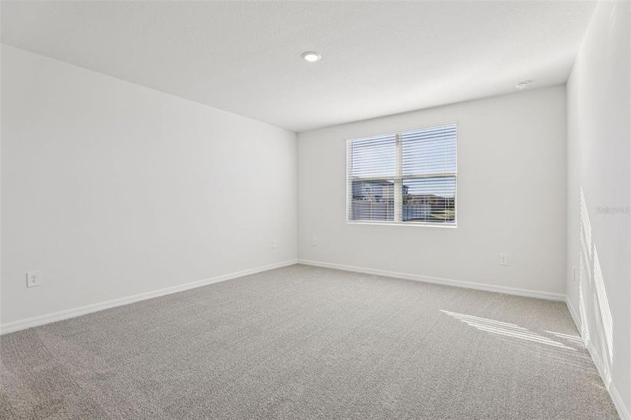 Spacious, unfurnished interior of a new home in Lake Deer Estates - Signature Series, Poinciana (Image 26).