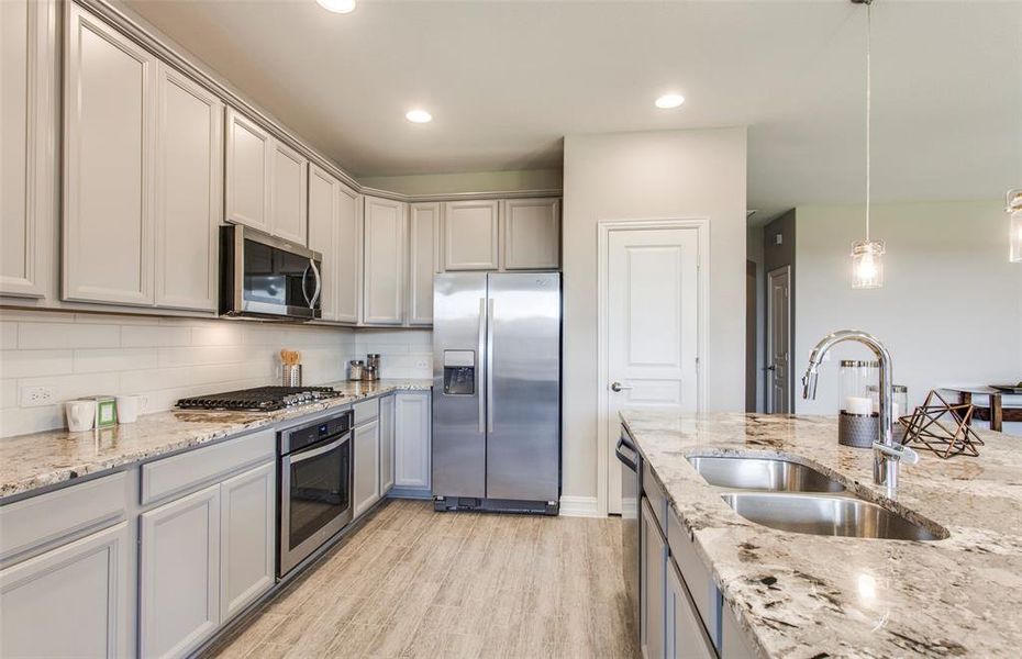 *Model Representation - Abundant cabinet space in kitchen