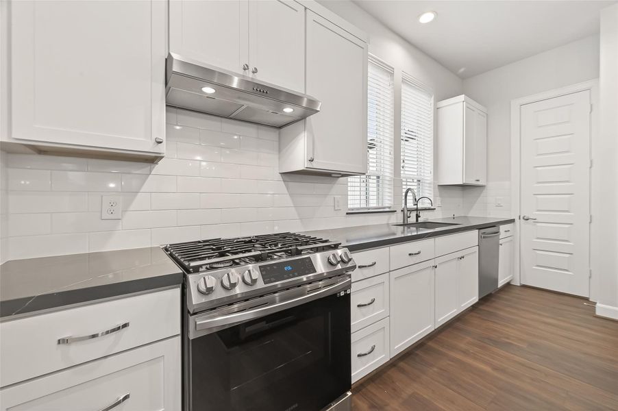 Furnished interior view inside a new home in The Corner At Buffalo Pointe, Houston (Image 11).