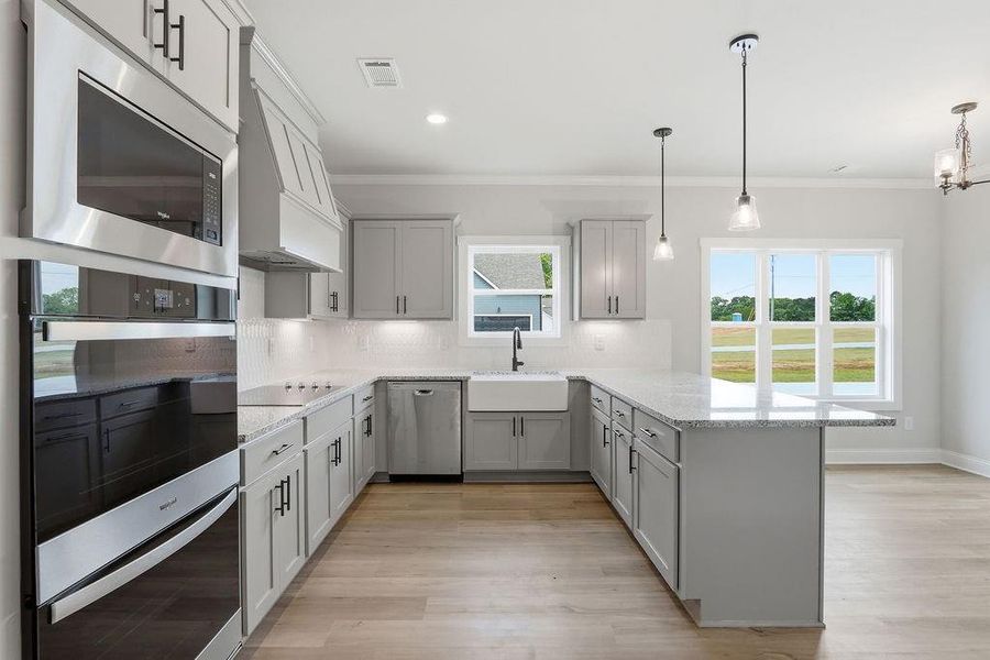 Furnished interior view inside a new home in , Monroe (Image 13).