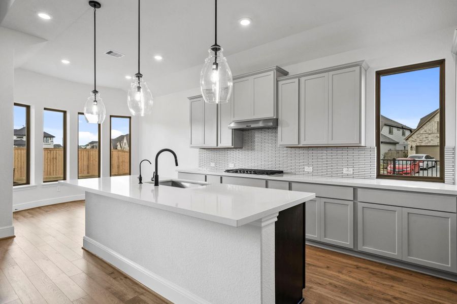 Furnished interior view inside a new home in Bridgeland 55', Cypress (Image 9).