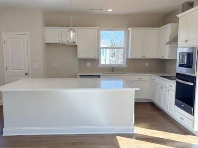 Furnished interior view inside a new home in , Buford (Image 8).