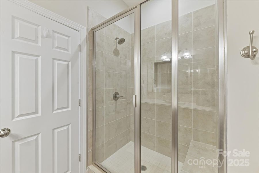 Primary Bath with tiled shower with bench!