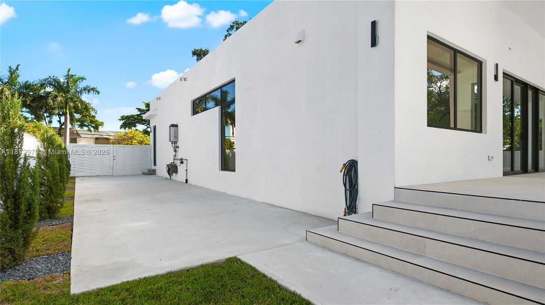 Exterior details and patio area of a home in , Miami Springs (Image 3).