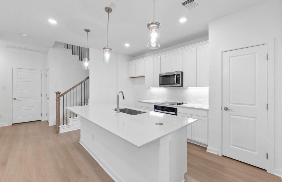 Furnished interior view inside a new home in Monarch on Main, Round Rock (Image 5).