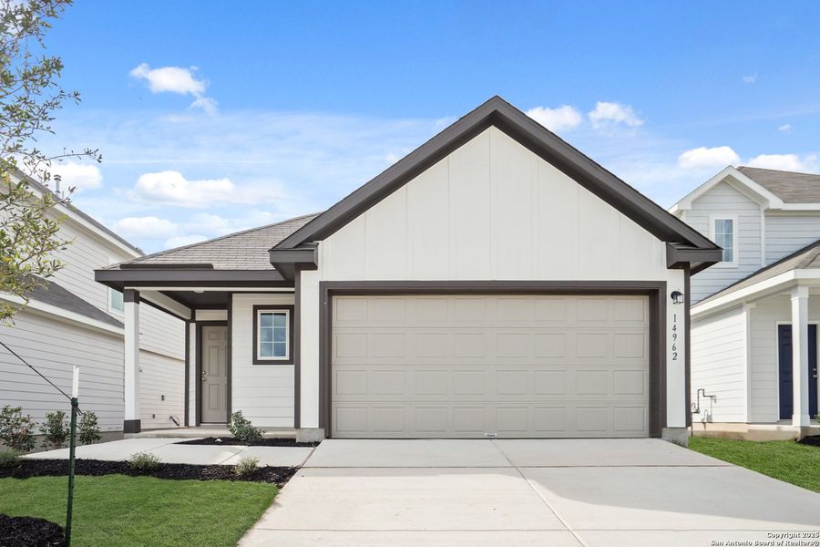 Front exterior of a new home in Timber Creek, San Antonio, TX, highlighting curb appeal (Image 1). Front exterior of a new home in Timber Creek, San Antonio, TX, highlighting curb appeal (Image 1).