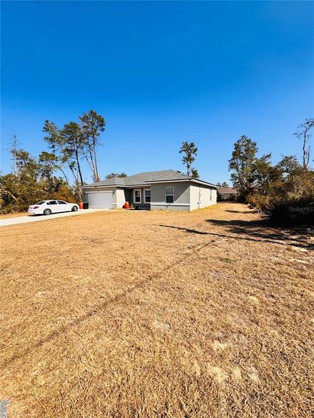 Exterior details and patio area of a home in , Ocala (Image 10).