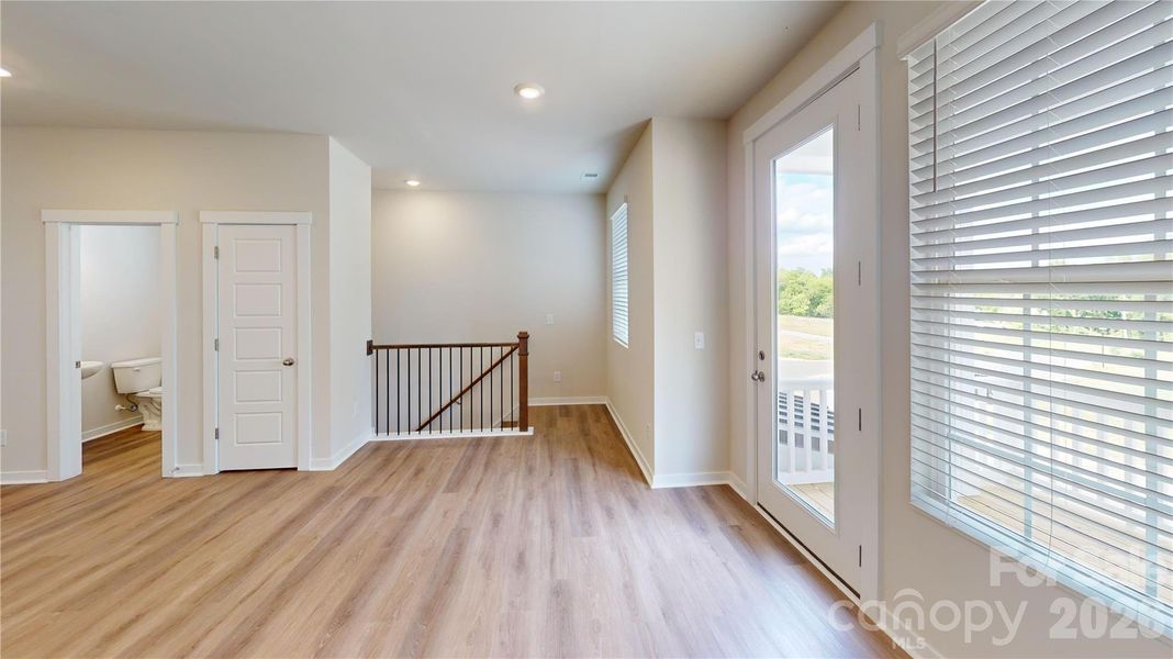 All photos representative of the Tinkham floorplan at Vanguard in Vermillion.