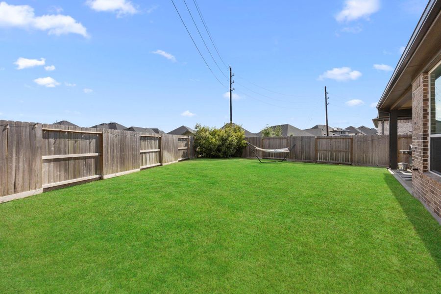 Exterior details and patio area of a home in , Fulshear (Image 19).