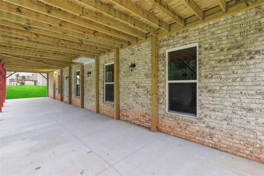 Exterior details and patio area of a home in Trinity Park, McDonough (Image 35).