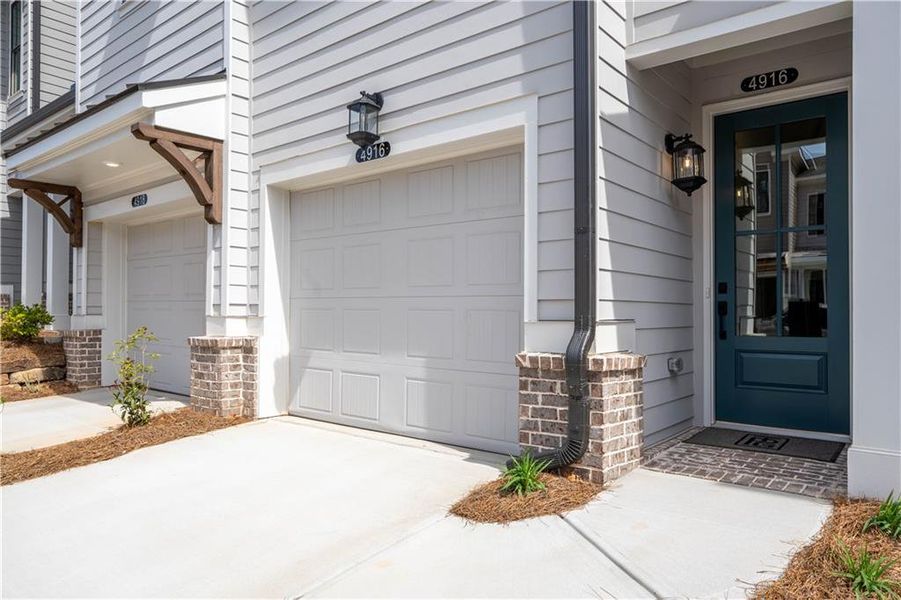 Front exterior of a new home in Waterside Condos, Peachtree Corners, GA, highlighting curb appeal (Image 2).