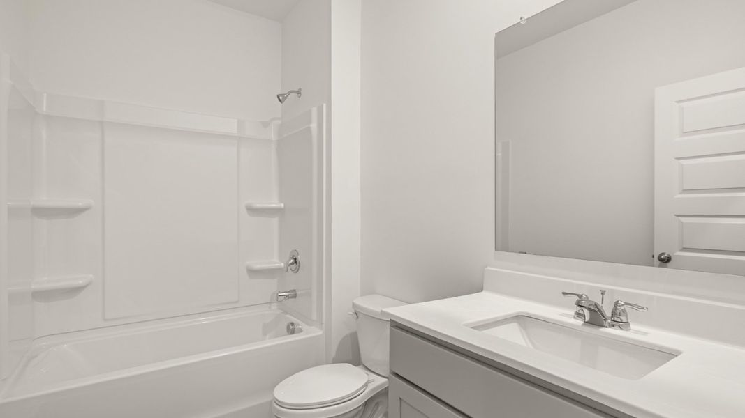 Representative furnished interior of a home built from the Cali by D.R. Horton in The Reserve at Calcutta, Stockbridge (Image 10).