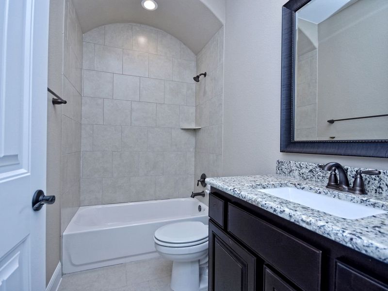 Representative furnished interior of a home built from the Madera II by Giddens Homes in Scofield Farms Estates, Georgetown (Image 228).