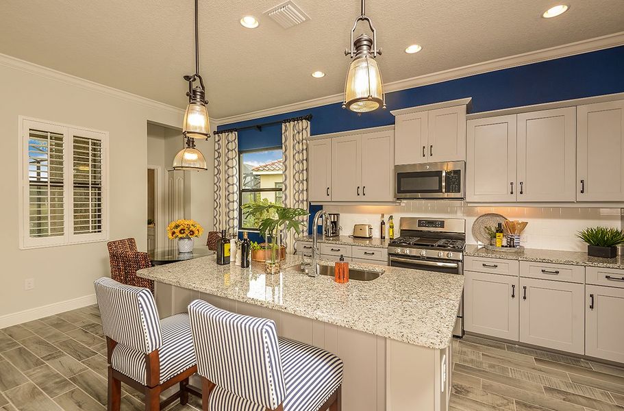 Representative furnished interior of a home built from the Endless Summer 4 by Neal Communities in Wildleaf at North River Ranch, Parrish (Image 7).