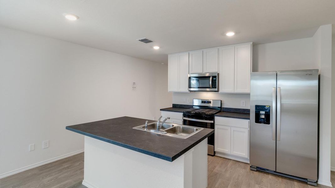 Furnished interior view inside a new home in Wayside, Uhland (Image 7).