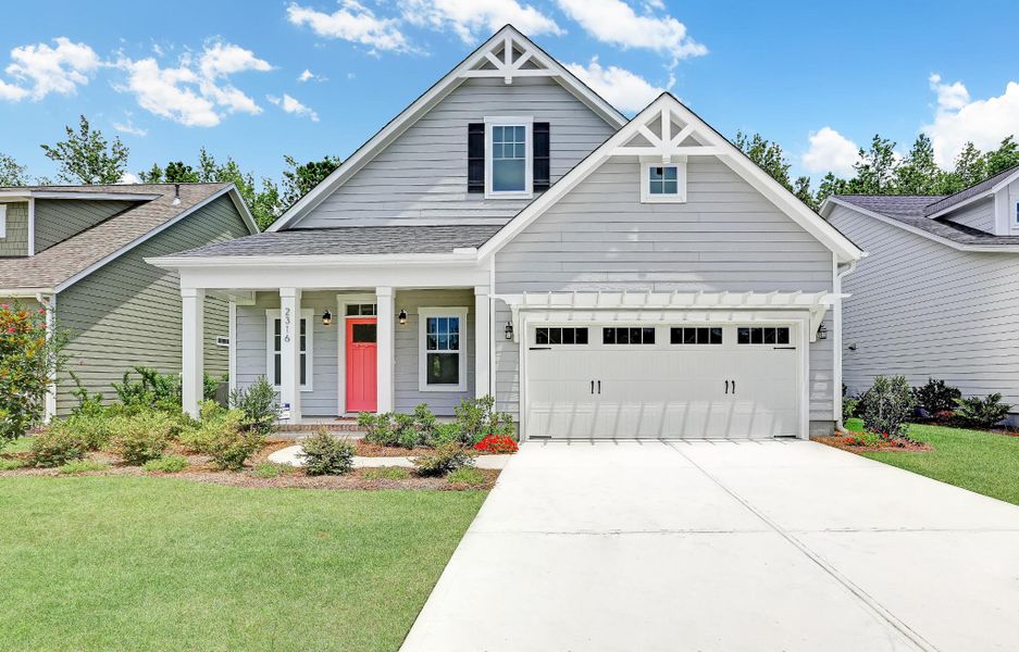 Representative exterior photo of a completed home built from the Banks by Bill Clark Homes in The Sanctuary at Sunset Beach, Sunset Beach, NC (Image 20). Representative exterior photo of a completed home built from the Banks by Bill Clark Homes in The Sanctuary at Sunset Beach, Sunset Beach, NC (Image 20).