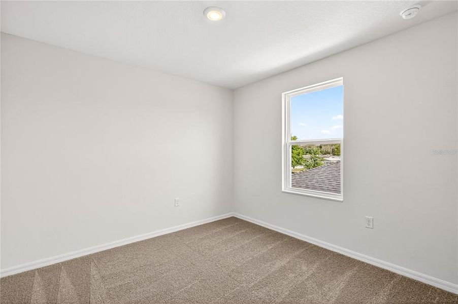 Spacious, unfurnished interior of a new home in Tula Parc, Astatula (Image 28).