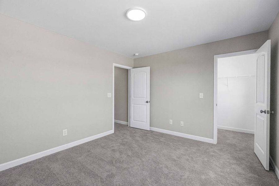 Representative unfurnished interior of a home built from the Pamlico by Caviness & Cates Communities in Bartlett Manor, Youngsville (Image 73).