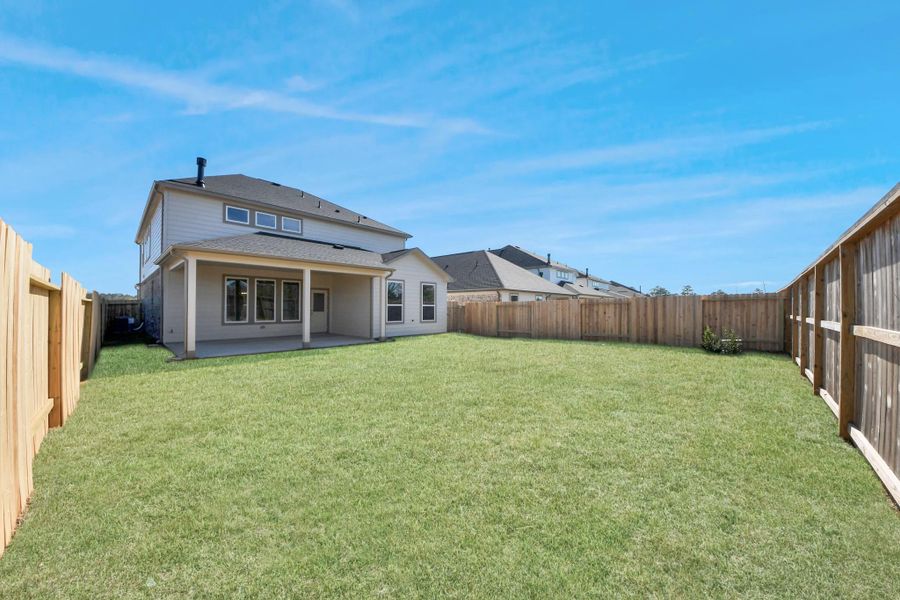 Explore the expansive backyard with its inviting covered patio—a perfect blend of space for the kids to play and adults to unwind. Ideal for creating your outdoor oasis, this backyard accommodates patio furniture, a BBQ pit, and endless possibilities for leisure and entertainment.