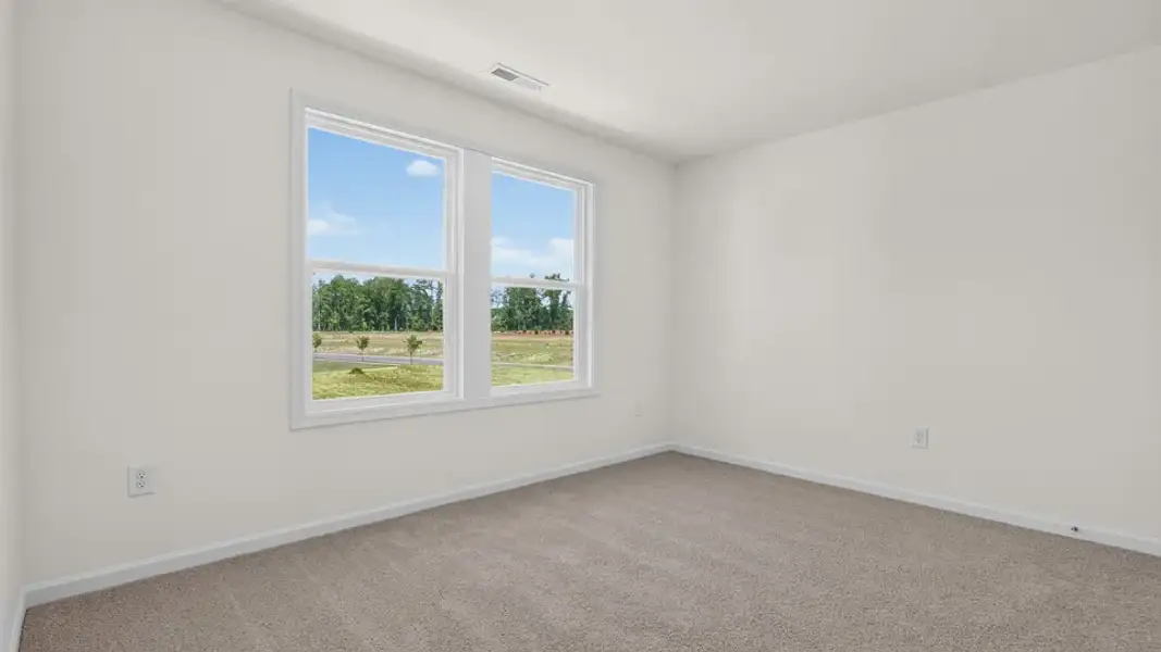 Spacious, unfurnished interior of a new home in Madden West, Fuquay Varina (Image 27).