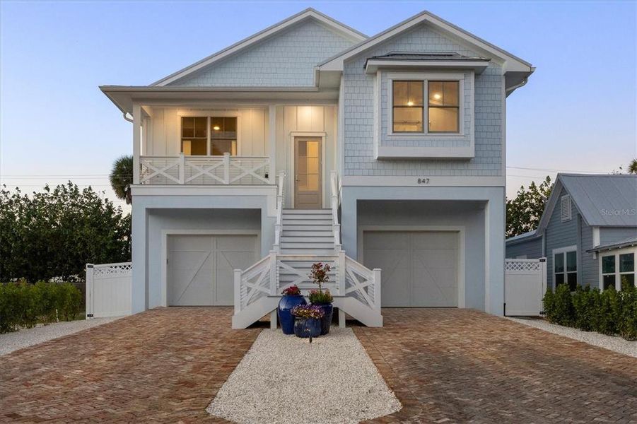 Front exterior of a new home in , Boca Grande, FL, highlighting curb appeal (Image 31).