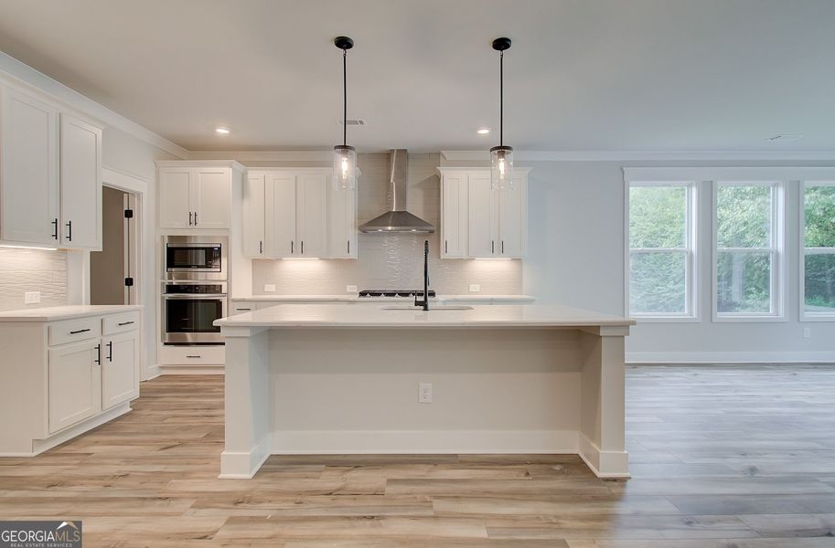 Furnished interior view inside a new home in Ponderosa Farms Reserve, Gainesville (Image 5).