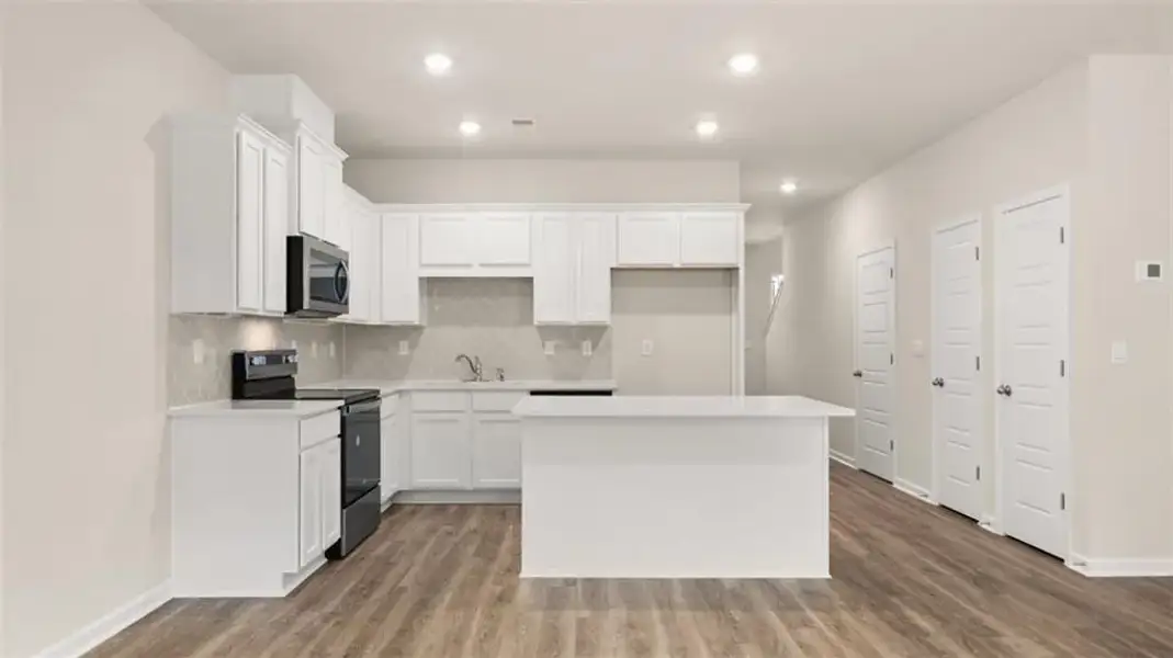 Furnished interior view inside a new home in The Gables at Agricultural Village, Perry (Image 7).