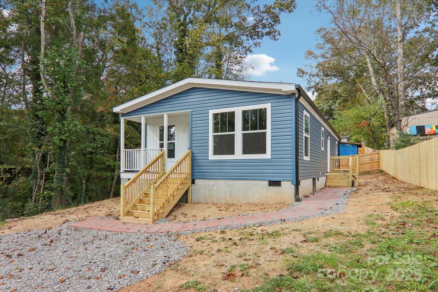 Exterior details and patio area of a home in , Asheville (Image 19). Exterior details and patio area of a home in , Asheville (Image 19).