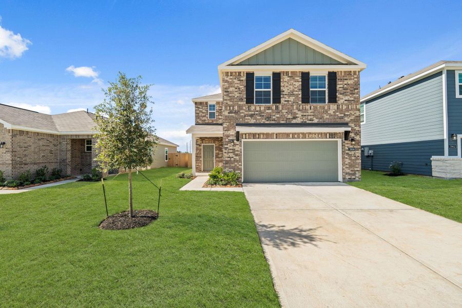Front exterior of a new home in Laurel Farms, Brookshire, TX, highlighting curb appeal (Image 2). Front exterior of a new home in Laurel Farms, Brookshire, TX, highlighting curb appeal (Image 2).