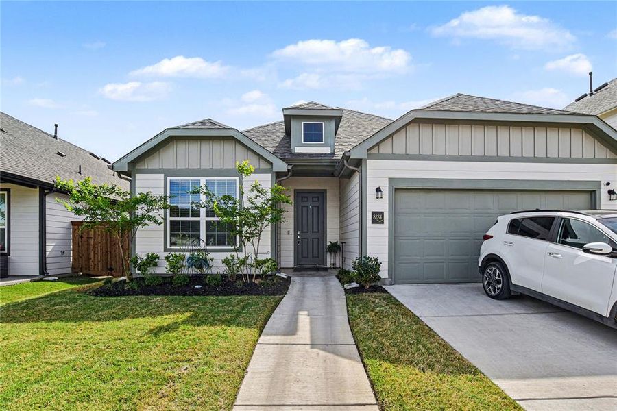 Front exterior of a new home in Waterscape, Royse City, TX, highlighting curb appeal (Image 20).