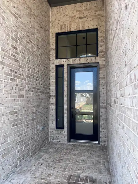 Exterior details and patio area of a home in Wood Leaf Reserve, Tomball (Image 2). Exterior details and patio area of a home in Wood Leaf Reserve, Tomball (Image 2).