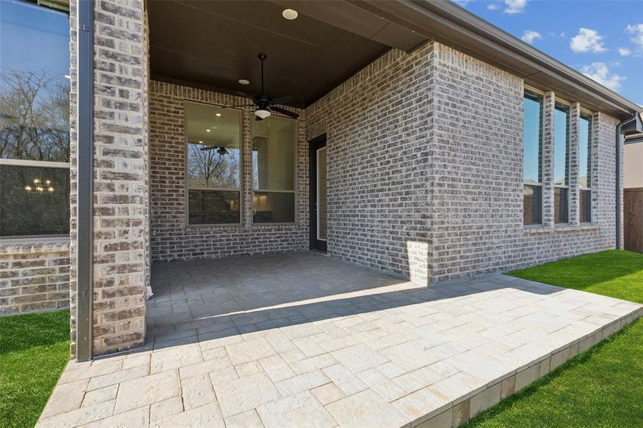 Exterior details and patio area of a home in , Aubrey (Image 26).