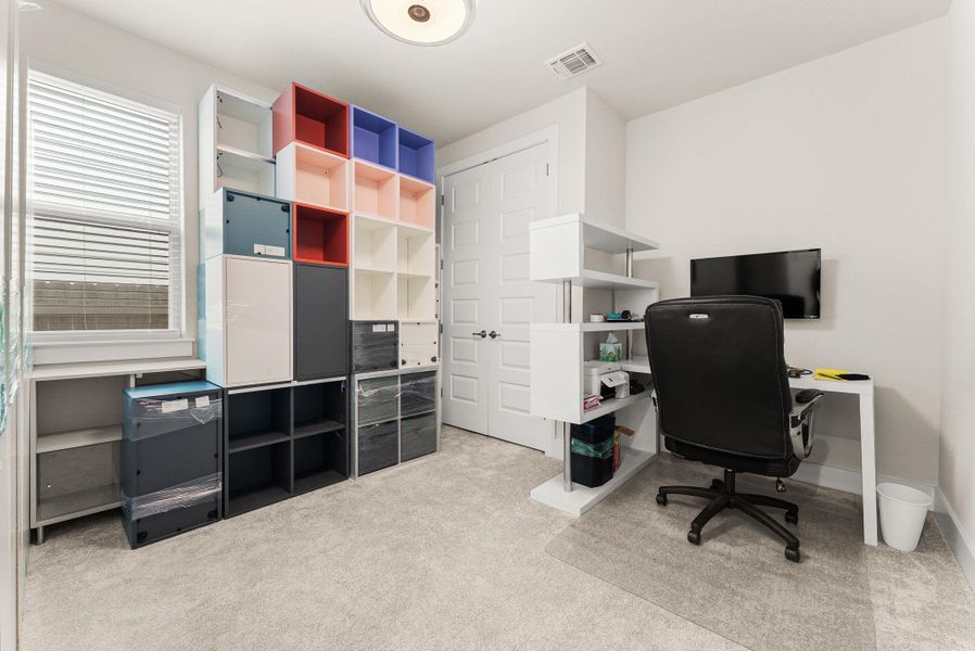 The second bedroom is located on the first floor and has a full bath adjacent.